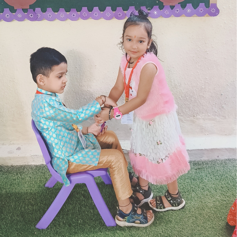 Raksha Bandhan celebrates the bond of love and protection between siblings, symbolized by the tying of a sacred thread, or rakhi, around the wrist.